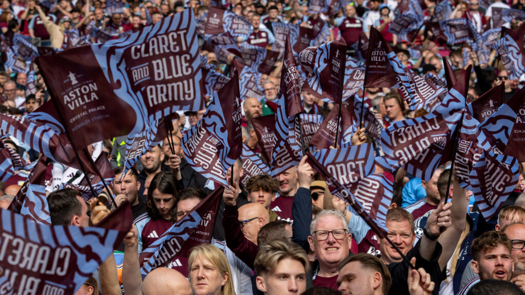 Aston Villa fans waving flags at Wembley