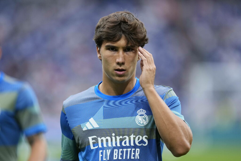Gonzalo Garcia holding his hand to his face while in Real Madrid training